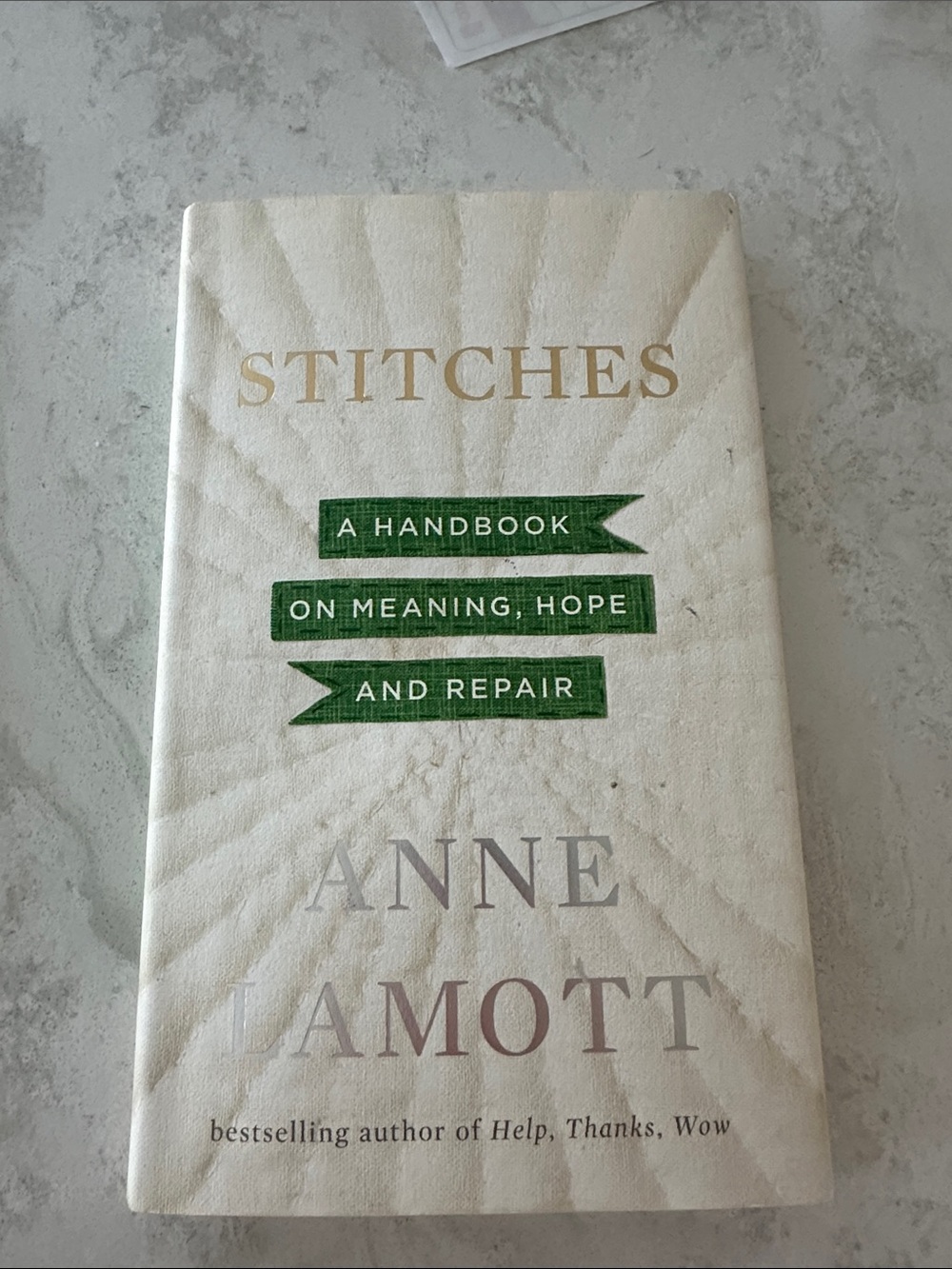 Stitches: A Handbook on Meaning, Hope and Repair - Cream & Green Cover